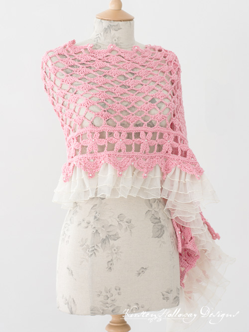 Crochet a beautiful lace wrap with beads for your next special event! A lace ruffle adds to the vintage feel and ups the charm of this free crochet pattern.