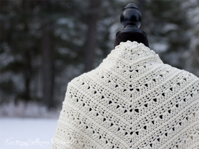 The classic triangle shape and lacy stitches make the Primrose and Proper shawl pattern a quick, easy and, beautiful project to dress up your wardrobe this winter. 