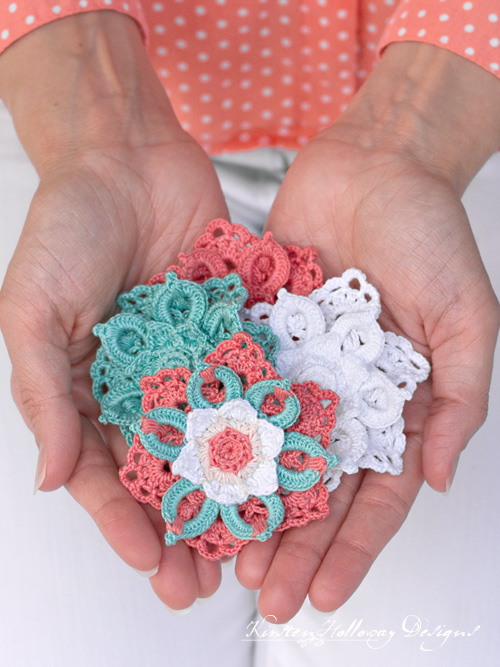 Crochet tropical flower hair clips make a pretty hair accessory for little girls. Close-up.