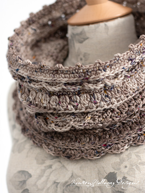 A Close-up of the Layer Cake lace cowl crochet pattern showing some of the yummy stitch details.