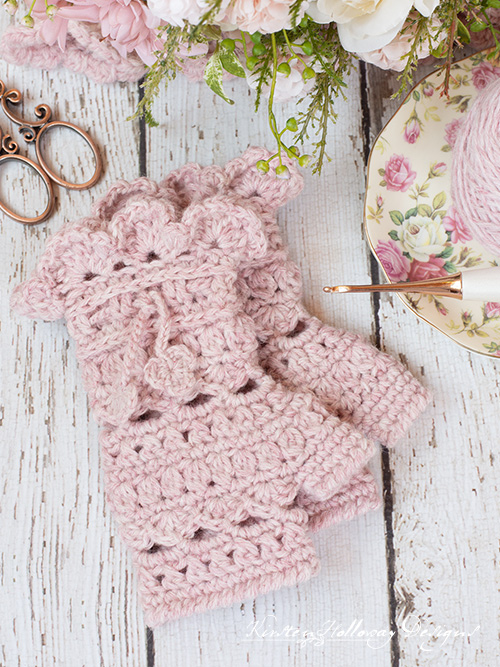 The Secret Garden crochet fingerless gloves pattern is lacy, yet warm and full of Victorian charm.