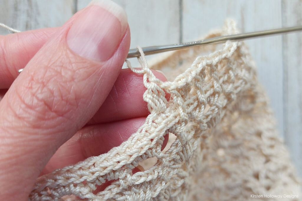 How to crochet across 2 different rounds for the top edge with lace - part 2.